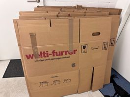 10 Umzugskartons Welti-Furrer gebraucht zusammengelegt