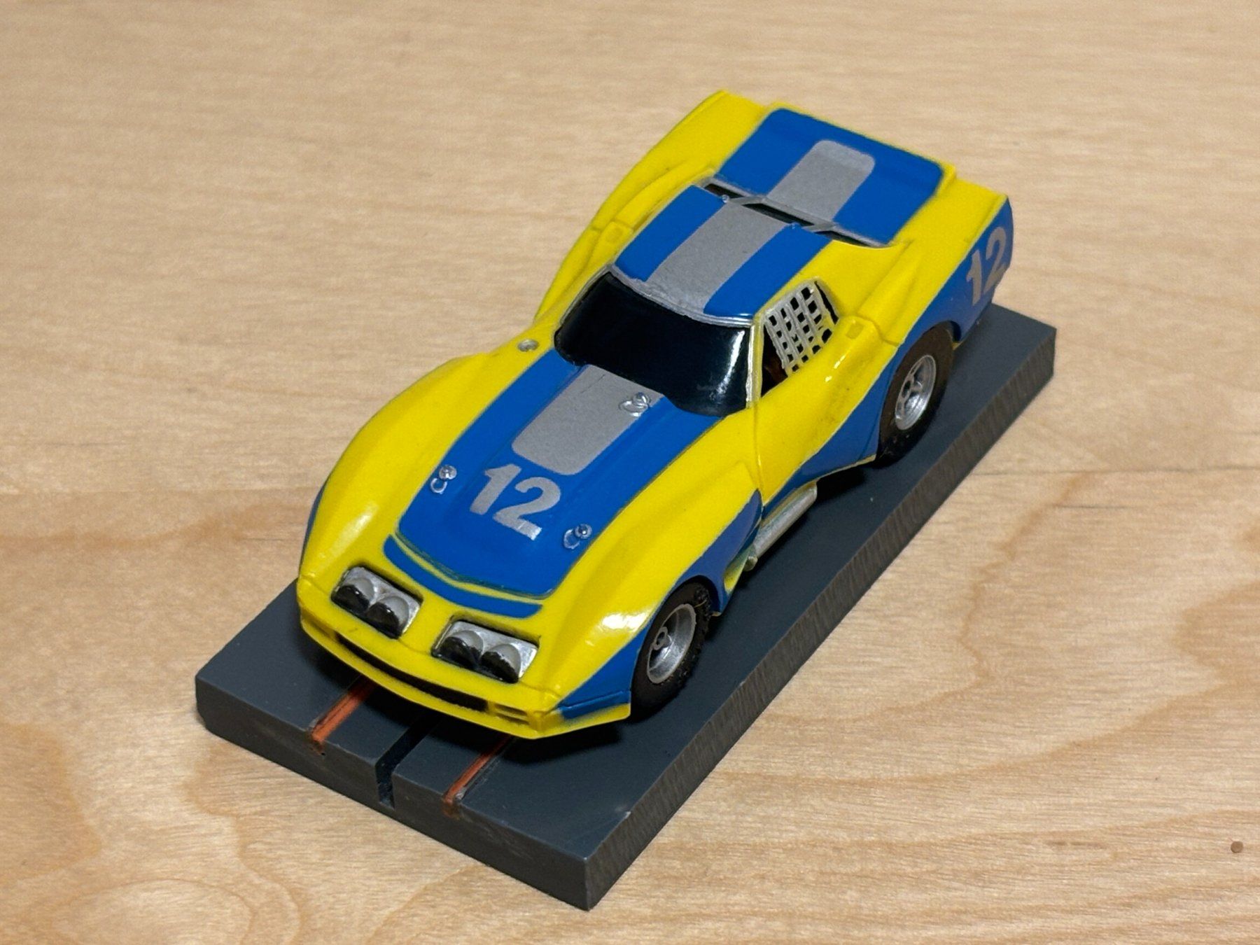 Faller Piste: Faller/Aurora AFX Corvette GT gelb/blau #12 – Usato da Bülach venduto da h0slotch