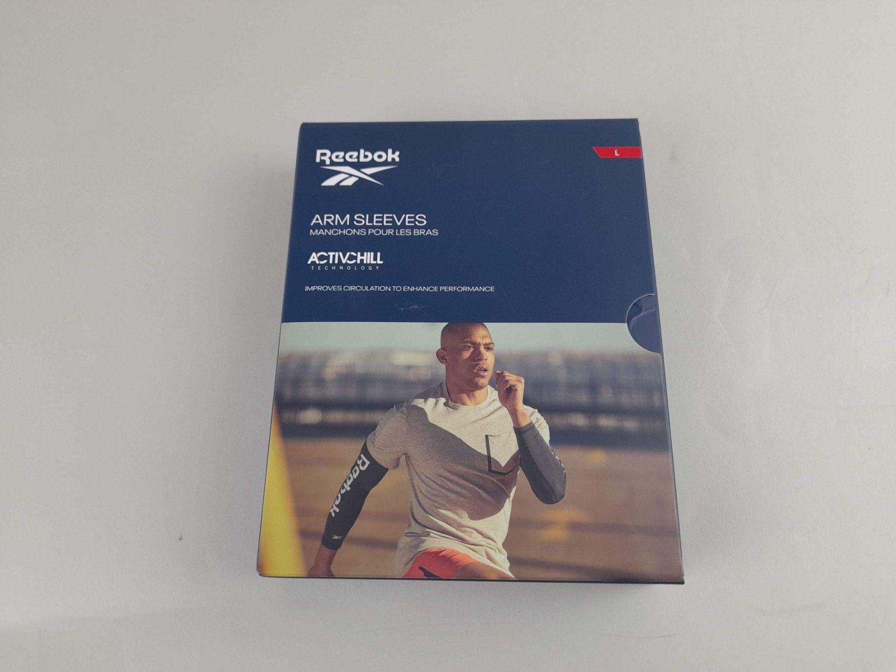 Reebok Pulls & Sweat-shirts: REEBOK Arm Sleeves Grösse L – Neuf (Voir description) à Liebefeld par Restwert_Liebefeld
