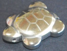 Deko Heilstein K-850 – Pyrit Schildkröte 20 x 27 mm