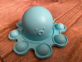 Blau-Weiss-Pinkes Oktopus Pop-it mit Gesichtchen, 8 Pops