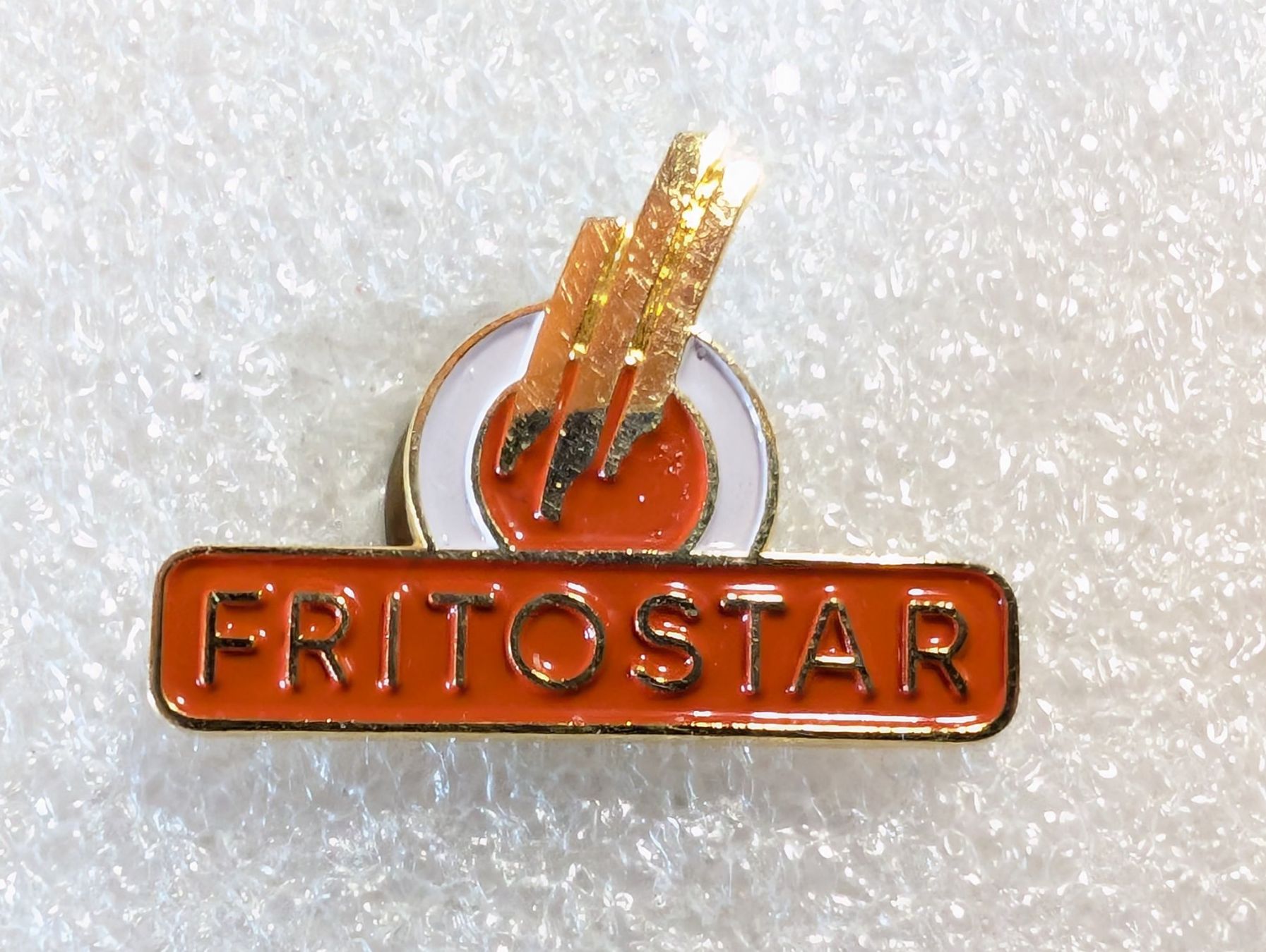Plaketten & Abzeichen: Ansteckpin 291: Fritostar – Gebraucht aus Oppligen von Pin-Fall-Shop