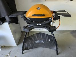Weber Q 1200 Orange Gasgrill mit Abdeckung Guter Zustand