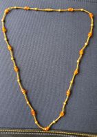 Chic Gold-Tone Necklace with Orange Faceted Beads