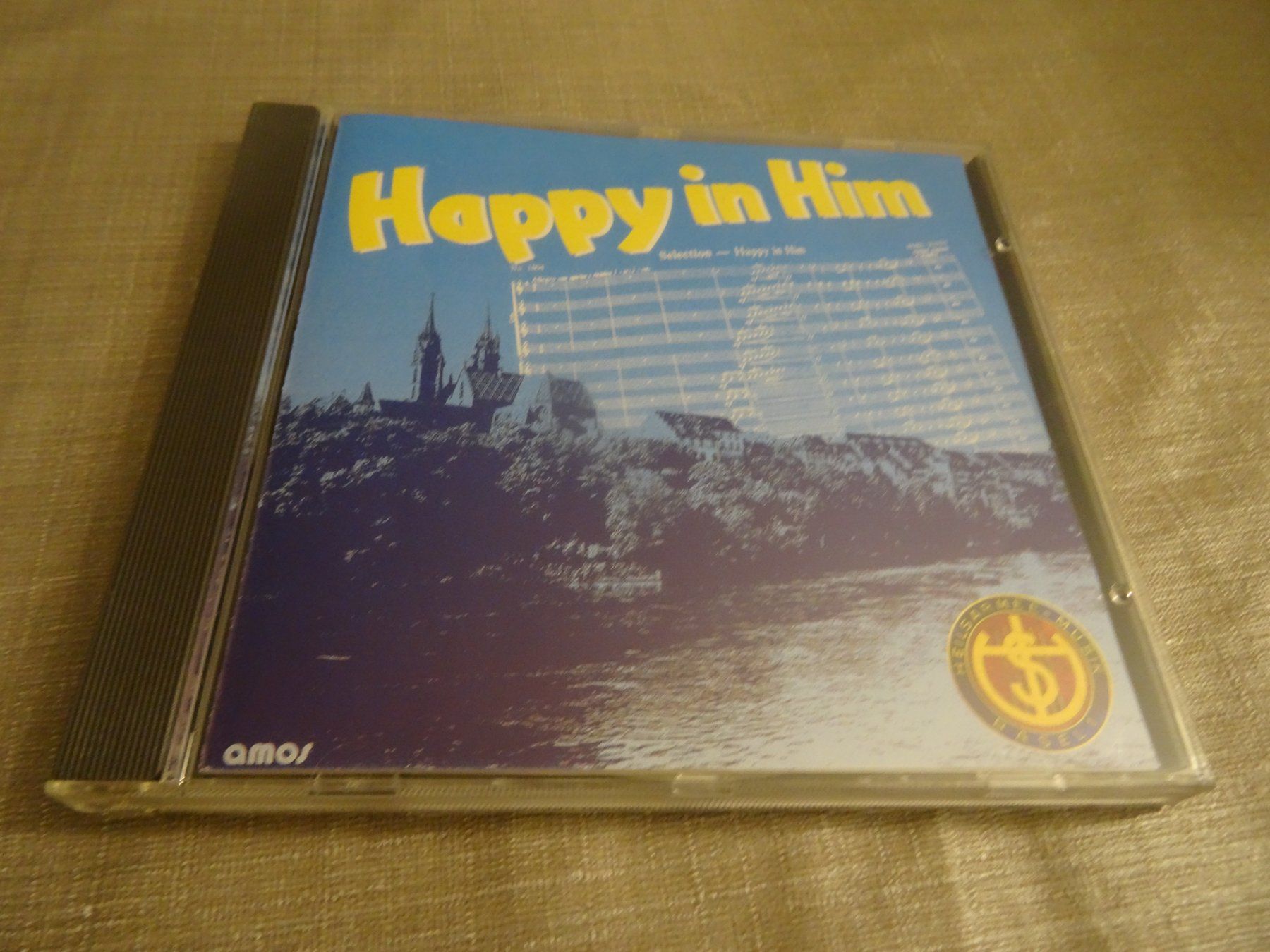 CD: CD: Happy in Him - Heilsarmee-Musikkorps Basel 1 – Usato da Olten venduto da Disc-Ausverkauf