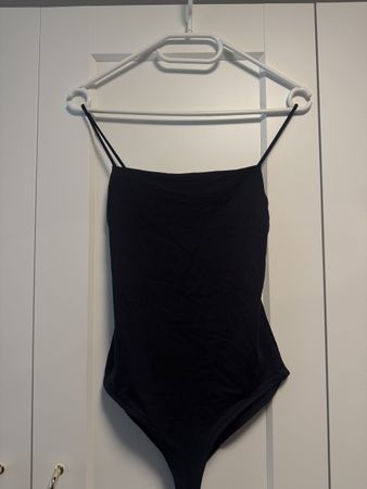 Schwarzer Zara Body mit Trägern, Grösse M - Neuwertig!