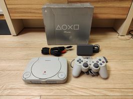 Console Play Station One, en boîte
