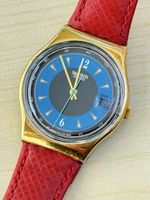 Swatch Uhr Gold Blaues Zifferblatt rotes Lederband