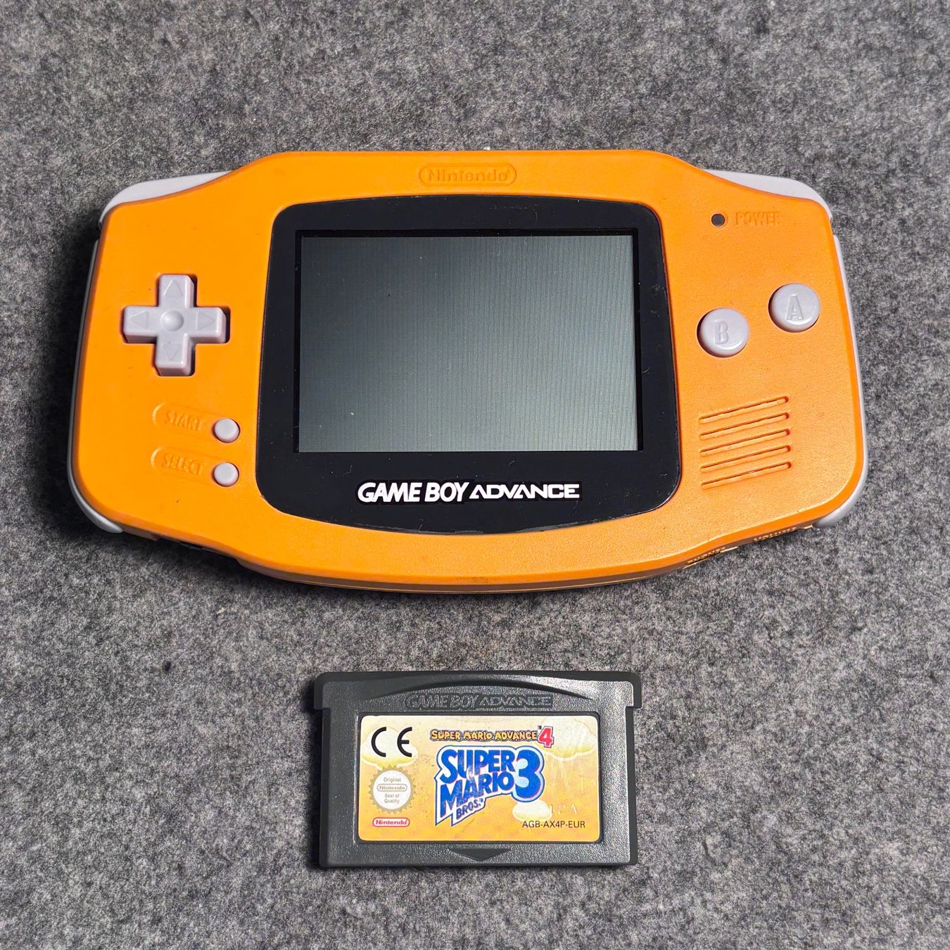 Nintendo Console: Gameboy Advance Orange + Mario 3 – Usato da Mollis venduto da GamingCorner