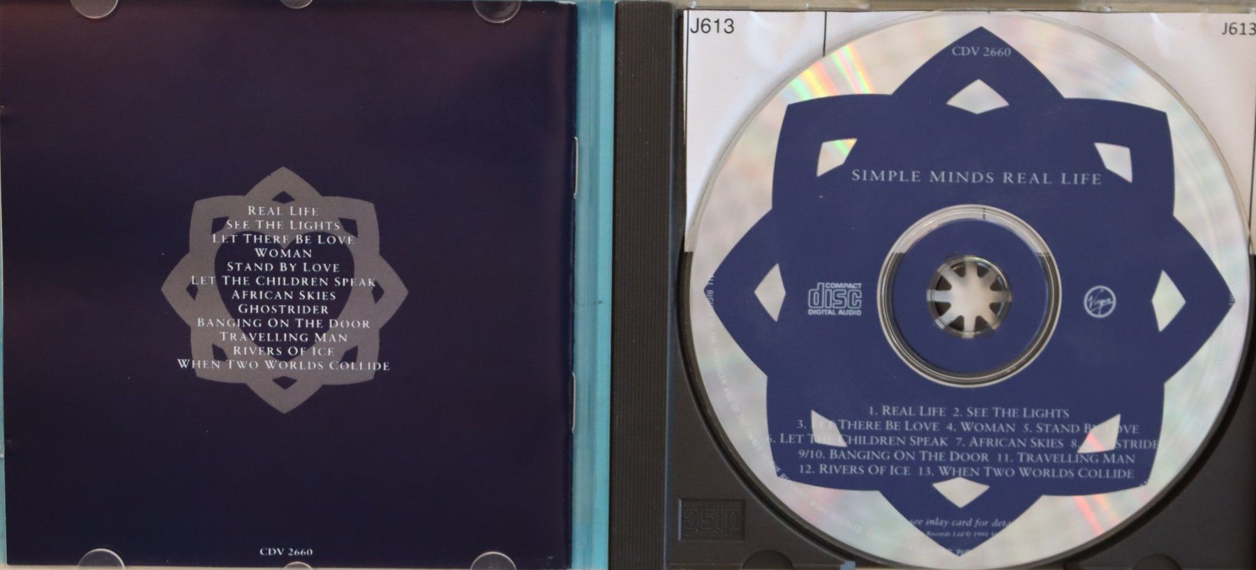 CDs: Simple Minds – Real Life – Gebraucht aus Luzern von CONTENTI 1
