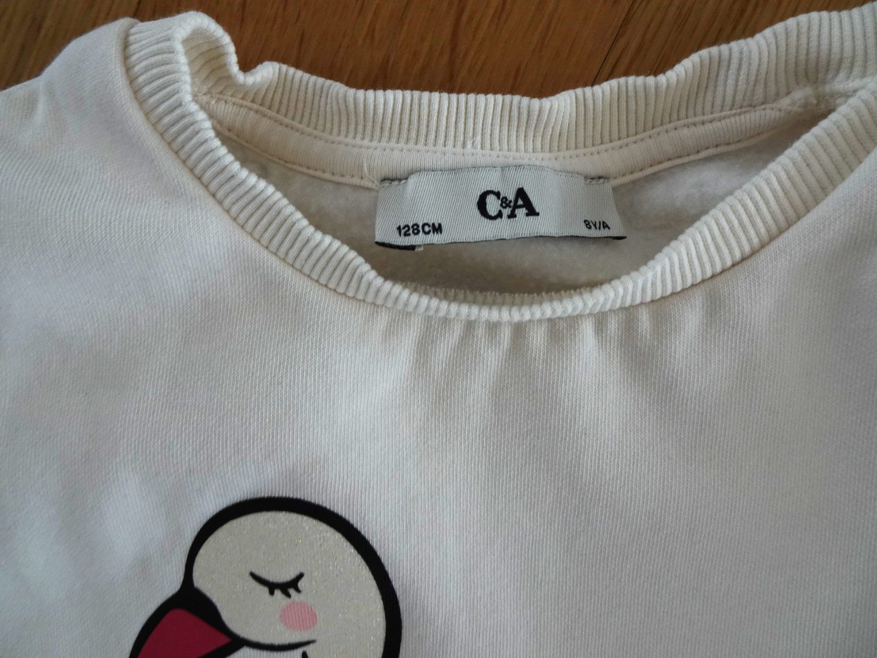 Lotti & Set di vestiti: 2 Röcke Tchibo Einhorn Vogel 2 Pullover Steppweste 122 128 – Usato da Winterthur venduto da blumeblau77 5