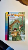 Le Bus Magique: Attention aux dinosaures! Book