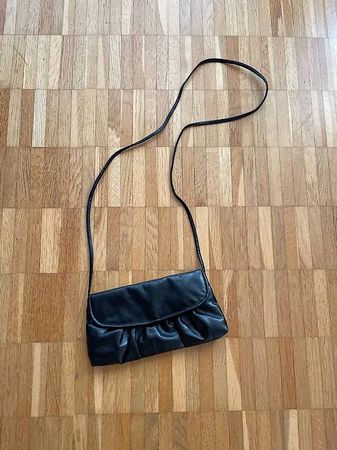 Schwarze Handtasche - ideal für Party-Nächte