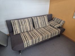 Schlafsofa / Bettsofa mit Kissen – funktional und bequem