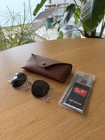 Ray-Ban rondes or comme neuve