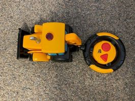 RC Bagger gelb mit Fernbedienung guter Zustand