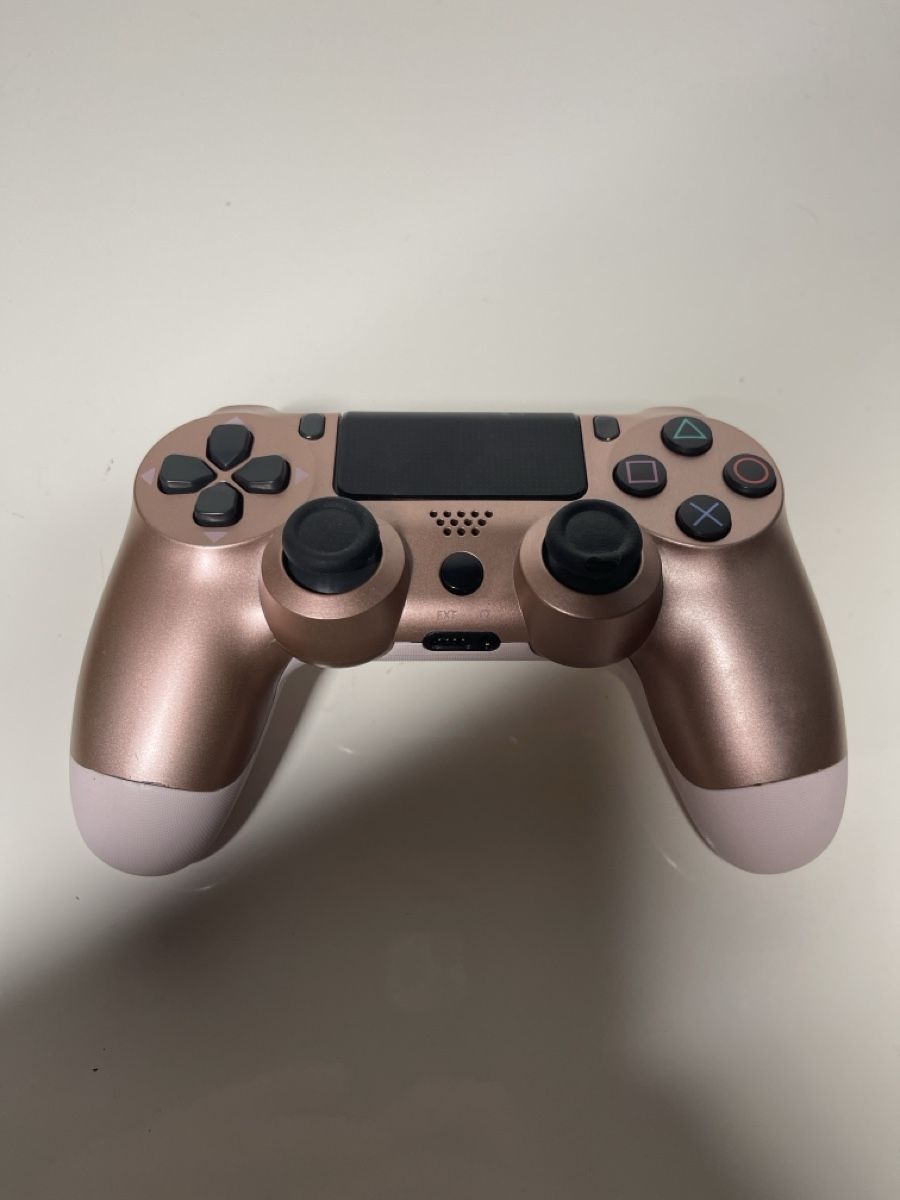 Manettes: PlayStation 4 Controller Rose Gold – Défectueux à Unterkulm par AnoliOccasion