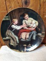 Antiker Zierteller "Das erste Lächeln" von Albert Anker