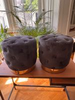 2 elegante Poufs / Polsterhocker in Schwarz mit goldfarbenem