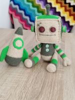 Robot en crochet avec sa fusée