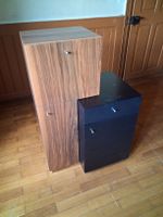 Sideboard mit Schubladen und Klappe. Nussbaum, schwarzer MDF