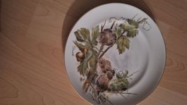 Teller mit Goldrand Drosseln