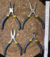 Set kleine Zangen, 4 Stück, ca. 12 cm.