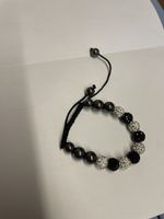 Armband mit runden Glitzersteinen