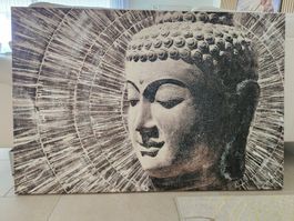 Leinwandbild Buddha Kopf mit strahlendem Hintergrund