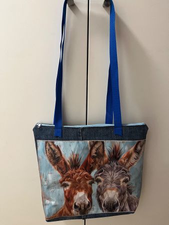 Eseltasche mit Jeans unicycle