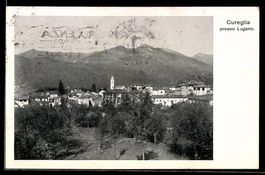 AK Cureglia, Paese con chiesa e montagne