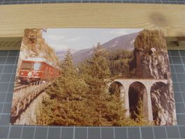 Echtfoto Landwasserviadukt mit Zug