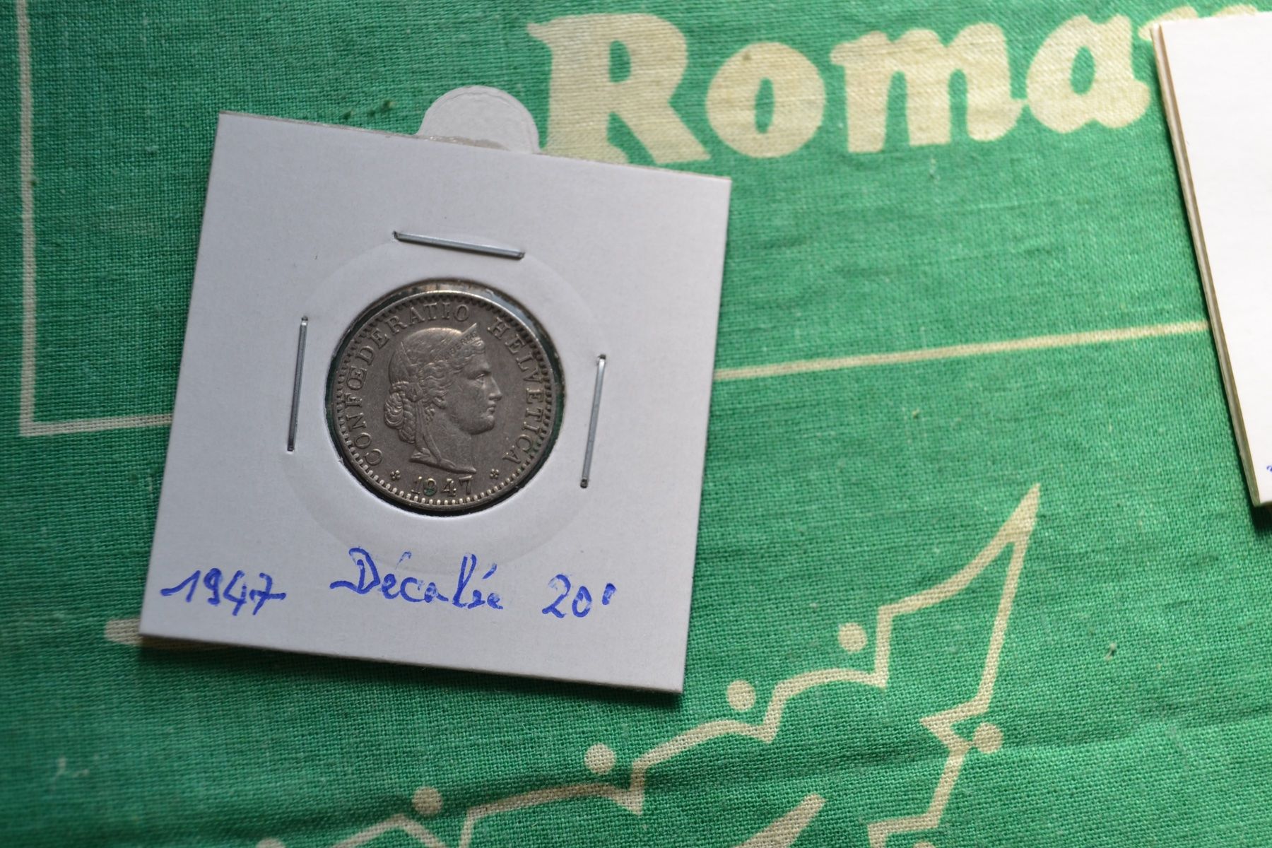 Alle Münzen: 20 Centimes 1947 Décalée 20° – Gebraucht aus Renens VD von Doidefee 1