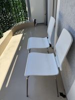 Two white chairs used condition