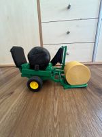Bruder Ballenwickler mit  2 Rundballen