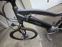Velo electrique Leopard noir annee 2023 bon etat 