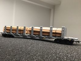 Flachwagen mit Ladung Holz Märklin H0