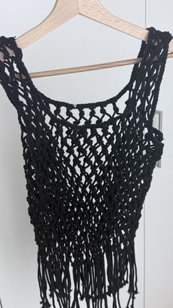 Top crochet noir pour l'été. Très tendance! 45 caractères