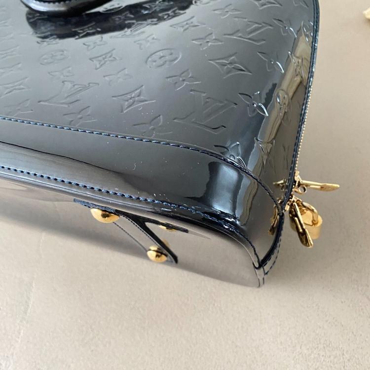 Louis Vuitton Tasche Lackleder