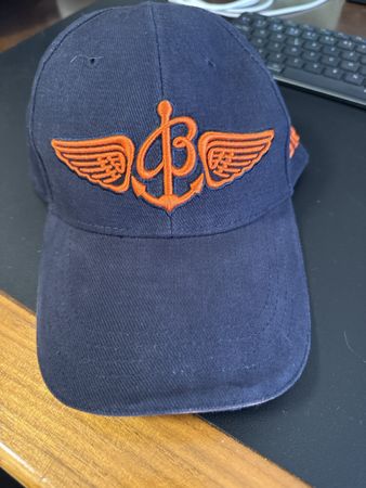 Breitling Cap dunkelblau mit orange Stickerei neuwertig