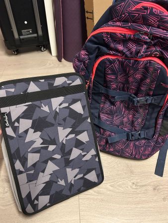 Satch Schulrucksack mit einer passenden Mappe/Ordner