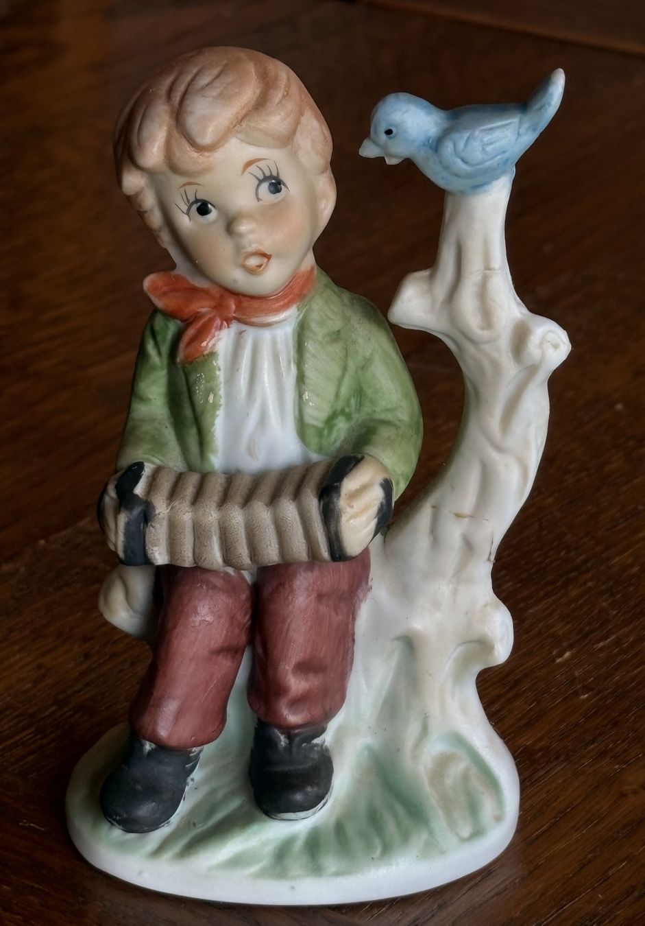 Statuette: Junge mit Ziehharmonika & Vogel. – Usato da Neukirch-Egnach venduto da Phion 7