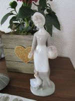 Hübsche Porzellanfigur
