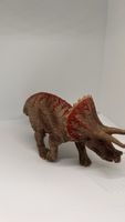 Spielzeug Dinosaurier Triceratops braun guter Zustand