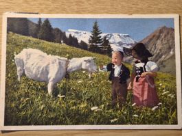 Postkarte Trachtenkinder mit Geiss - Gyger Adelboden