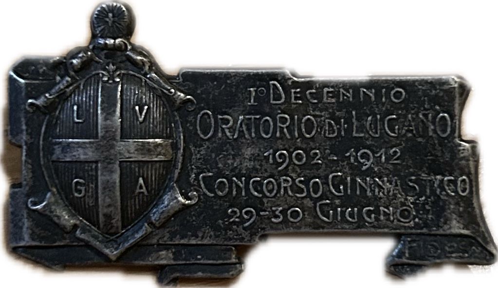 Medaglie: Abzeichen, Ticino, Lugano 1912, Concorso Ginnastico  – Usato da Breganzona venduto da Milesbo