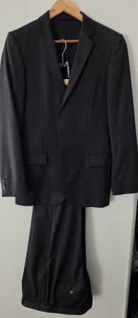 Hugo Boss Anzug schwarz Grösse 46 wie neu