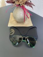 Nouvelles lunettes de soleil Ray-Ban.
