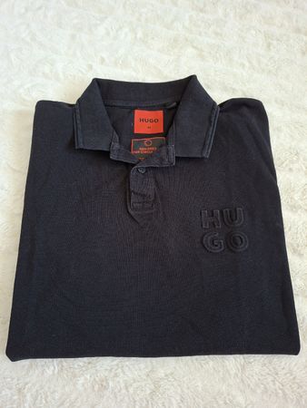 Polo Hugo homme noir taille M bon état