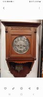 Horloge murale ancienne en bois